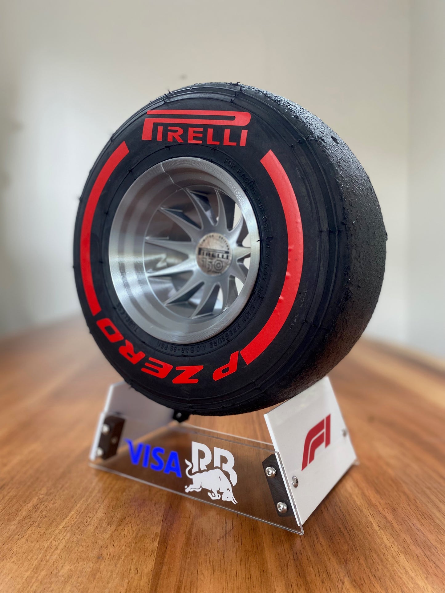 Dan Ricciardo (RB) - F1 Tyre with Stand