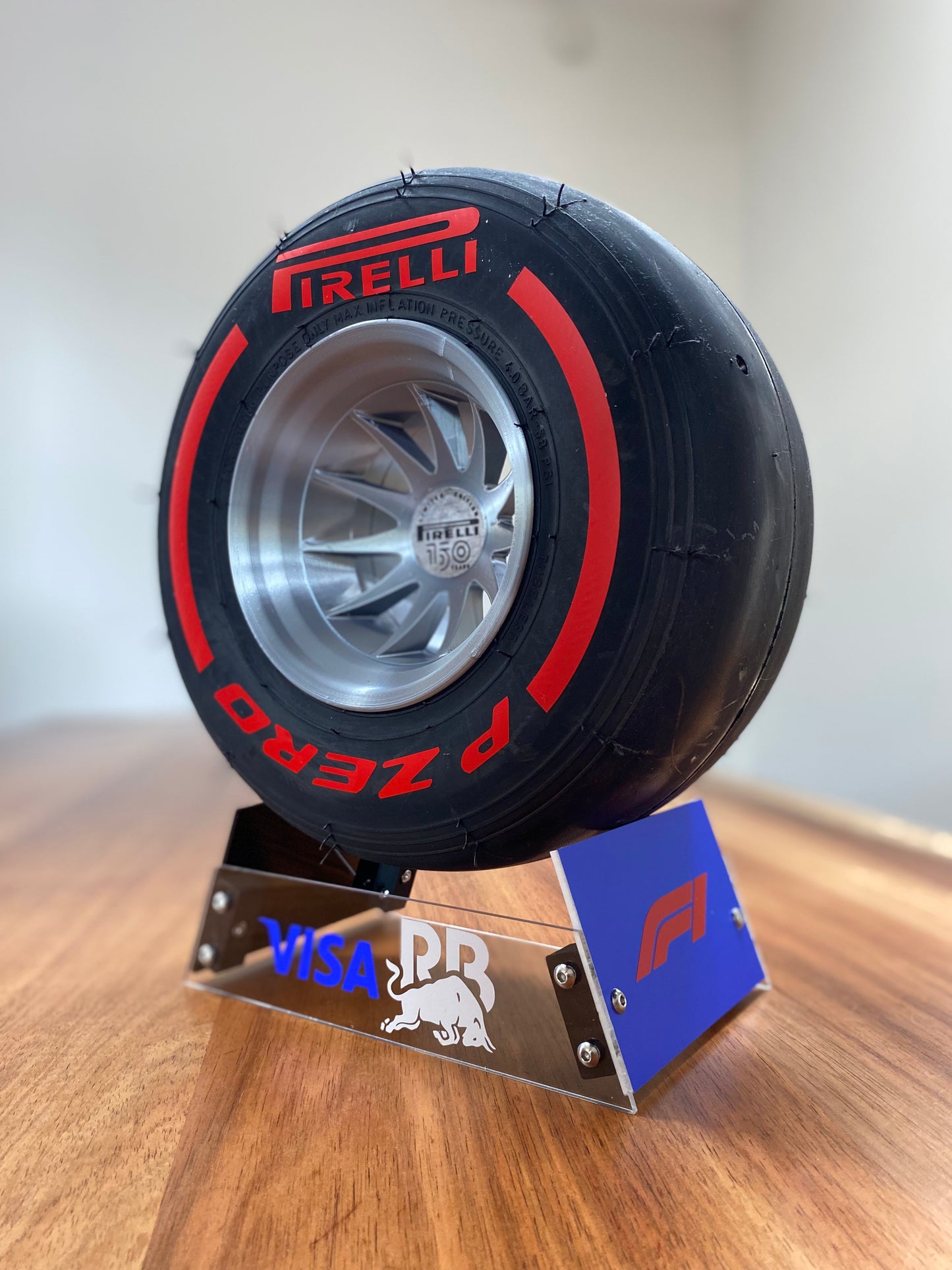 Liam Lawson SIGNED (RB) - F1 Tyre with Stand